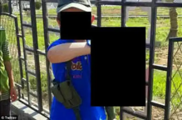 7-Year-Old Boy Poses With A Slain Syrian Soldier’s Head | PHOTO